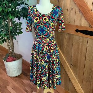 Woman’s LULAROE Colorful Aztec Midi Dress Rounded neck Short sleeve Size Small.